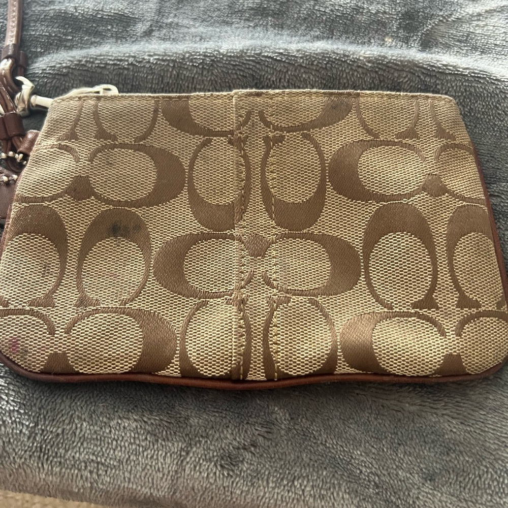 Coach Corner Zip Wristlet In Signature Canvas